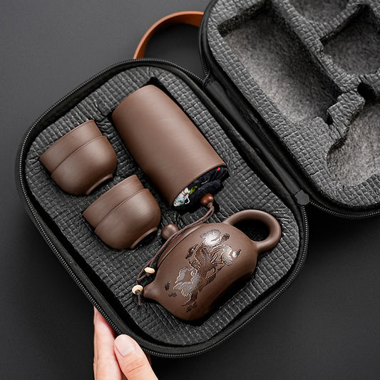 Travel tea set suit. A pot of four cups for outdoors & a portable bag.